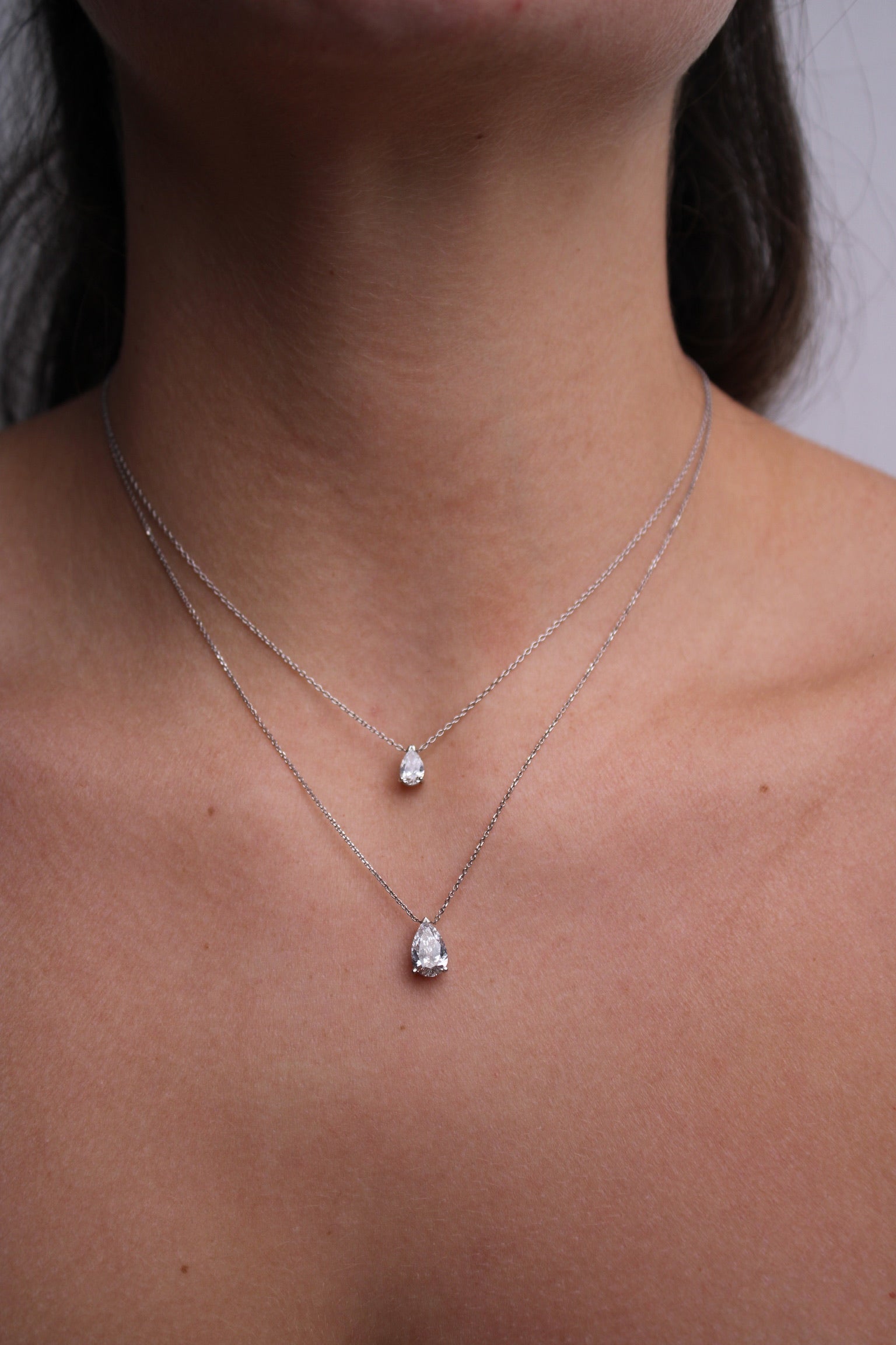 Pear shape floating diamond