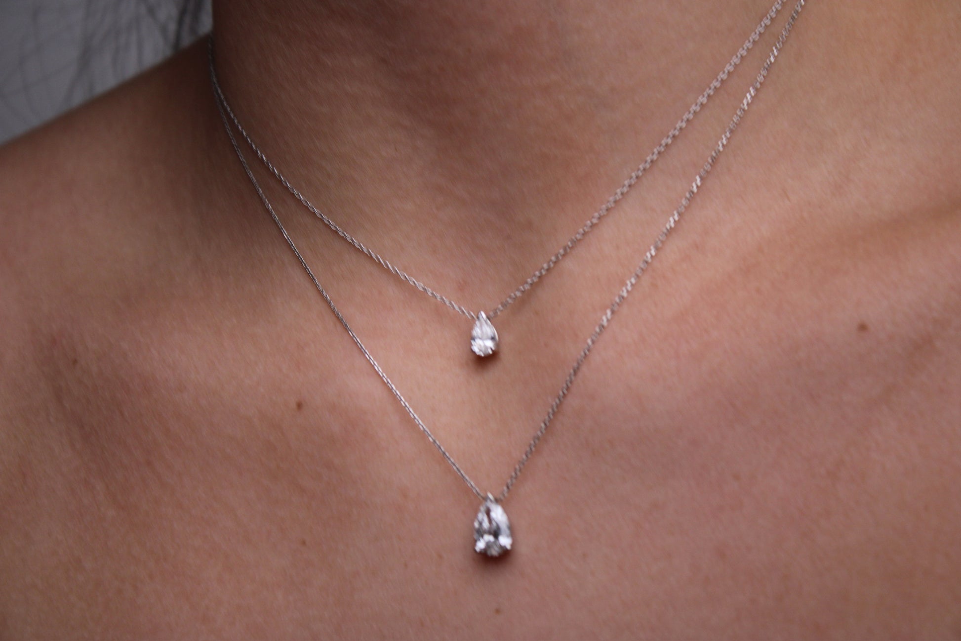 Pear shape floating diamond