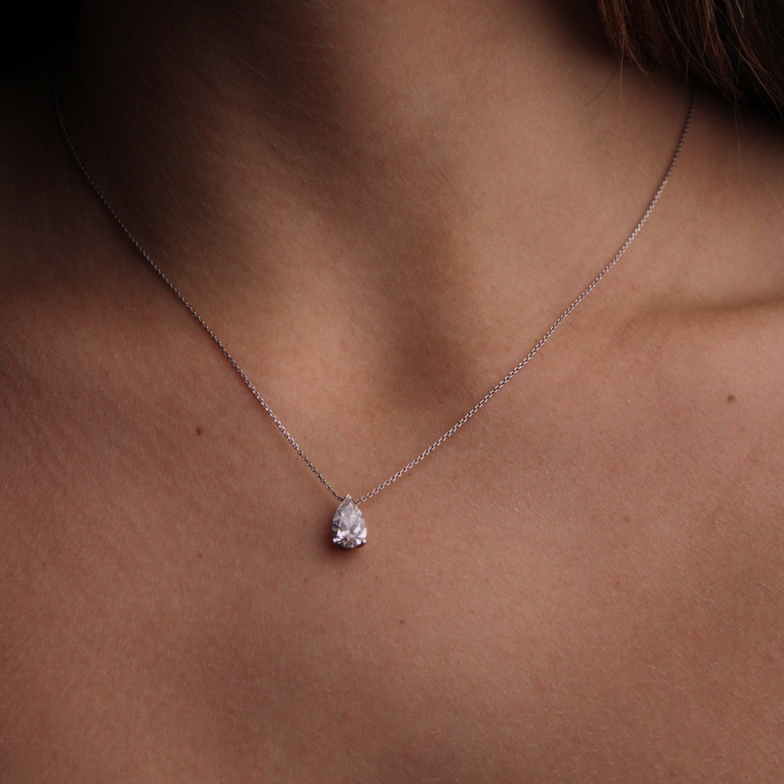 Pear shape floating diamond