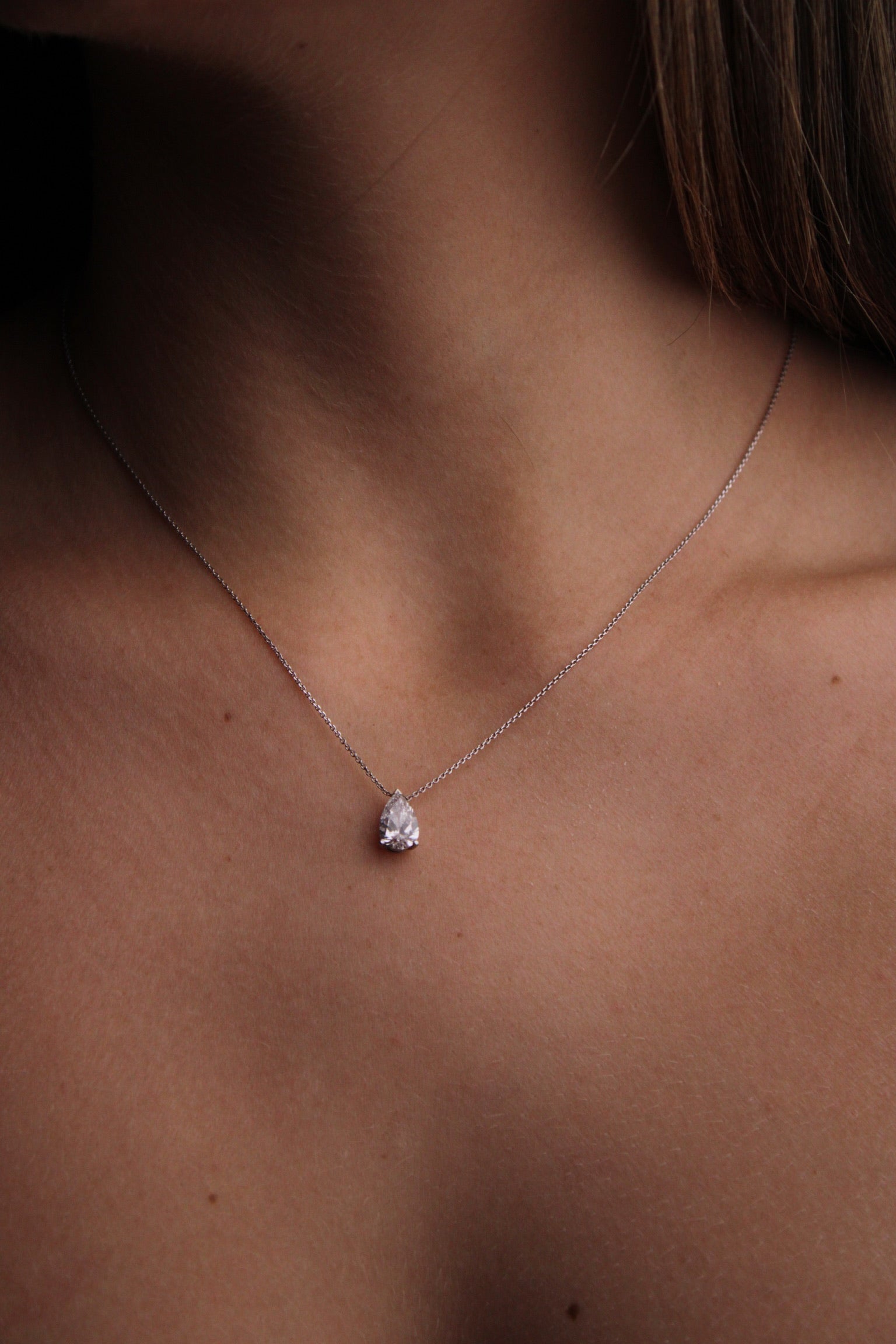 Pear shape floating diamond