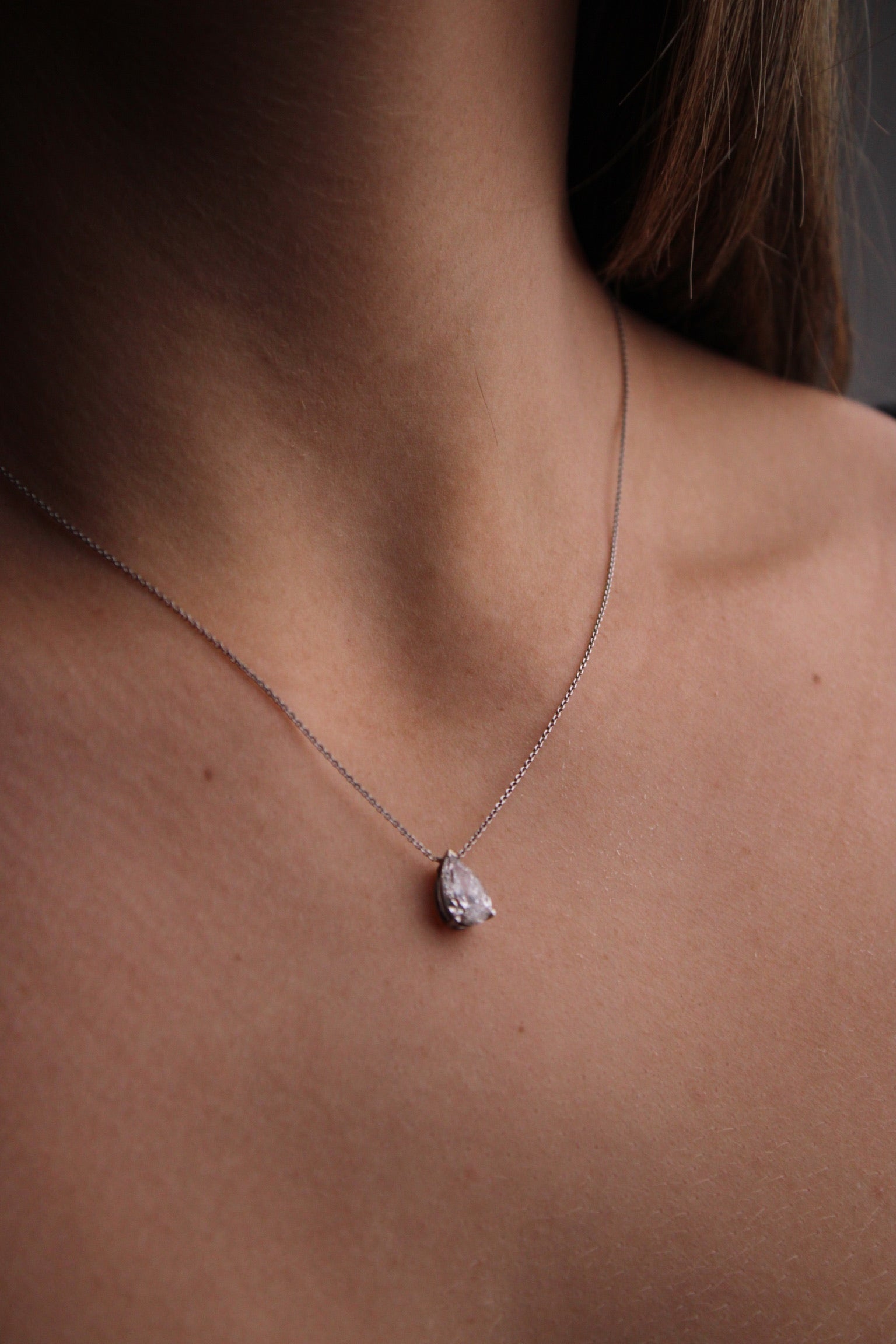 Pear shape floating diamond