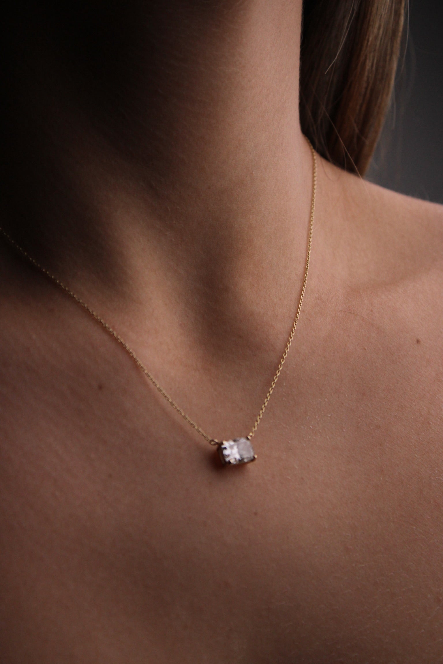 Elongated cushion floating diamond