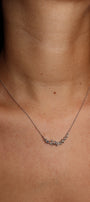 Multishape diamond smile necklace